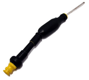 A cylindrical section of shrink tubing holds a screwdriver and is connected to a quick change locking mechanism