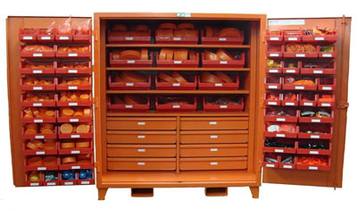 An extra large orange cabinet stocked with a large variety of foreign material exclusion supplies