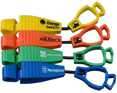 A variety of branded glove clips spread out for display
