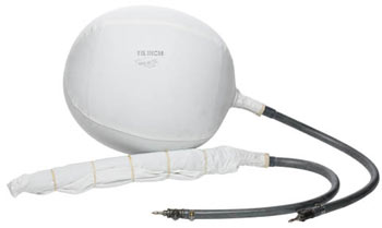 An inflated white plug next to an uninflated plug