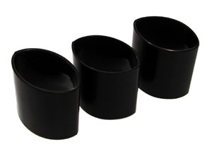 Three black cylinders stacked next to one another