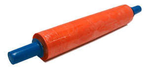 A roll of orange plastic material with blue handles